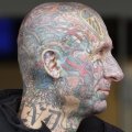 Miniatura de Cara Tatuada